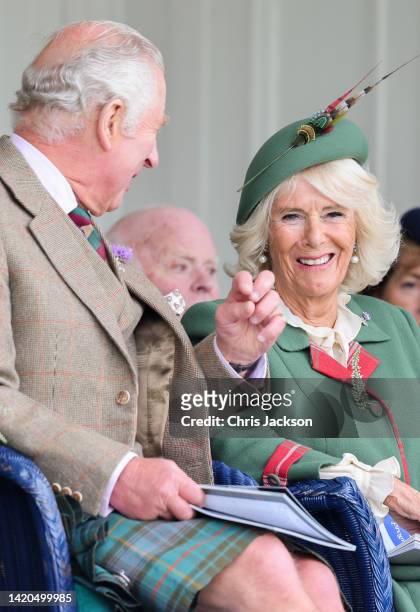 Prince Charles, Prince of Wales, known as the Duke of Rothesay when in Scotland and Camilla, Duchess of Cornwall laughing during the Braemar Highland...