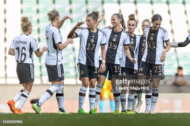Klara Buehl of Germany celebrates with her team mates after scoring her team second goal during the 2023 FIFA Women's World Cup qualification match...
