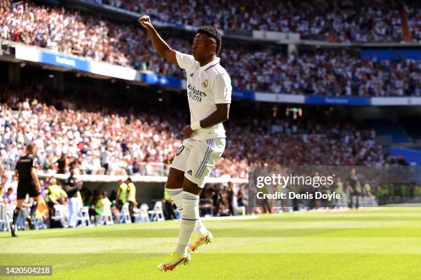 Vinicius Junior of Real Madrid celebrates after scoring their team's first goal during the LaLiga Santander match between Real Madrid CF and Real...