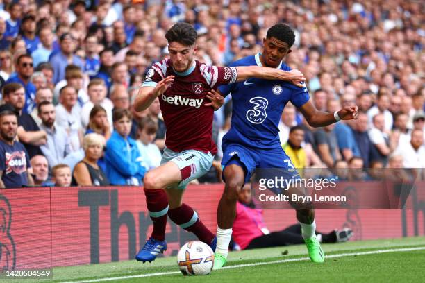 Wesley Fofana of Chelsea challenges Declan Rice of West Ham United during the Premier League match between Chelsea FC and West Ham United at Stamford...