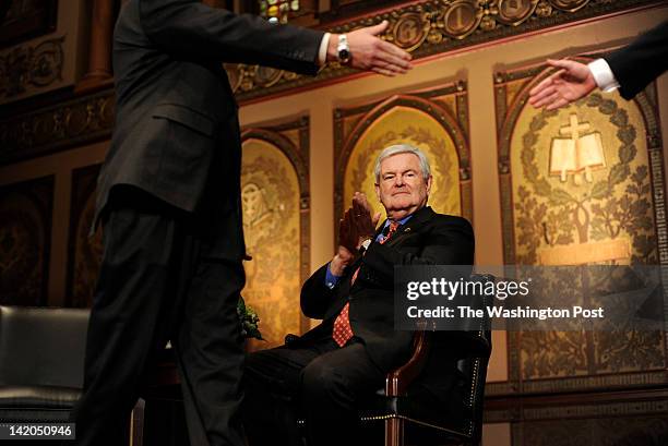 Republican Candidate for President former Speaker Newt Gingrich, joined on stage by Kevin Preskenis and Professor George Shambaugh , before speaking...