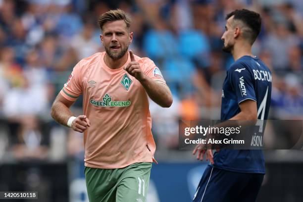 Niclas Fuellkrug of SV Werder Bremen celebrates scoring their side's second goal from a penalty during the Bundesliga match between VfL Bochum 1848...