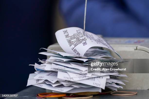 Winning bookmakers betting tickets at Ascot Racecourse on September 03, 2022 in Ascot, England.