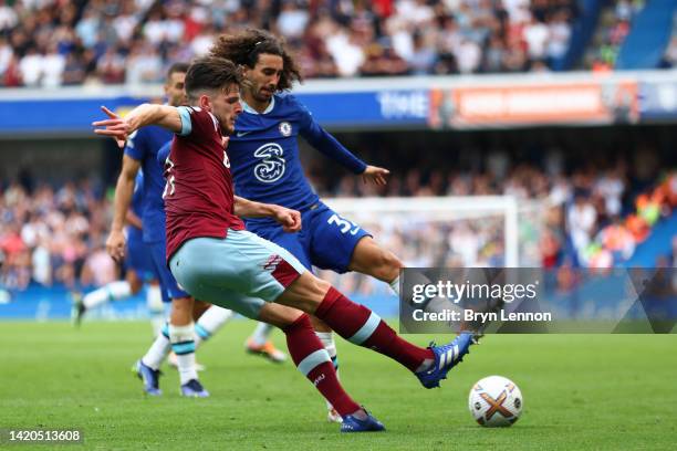 Declan Rice of West Ham United is challenged by Marc Cucurella of Chelsea during the Premier League match between Chelsea FC and West Ham United at...