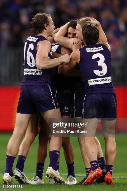 Team mates get around Jye Amiss of the Dockers after a goal during the AFL First Elimination Final match between the Fremantle Dockers and the...