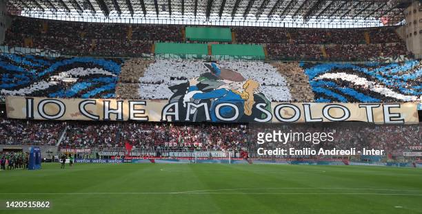 Internazionale fans show their support during the Serie A match between AC Milan and FC Internazionale at Stadio Giuseppe Meazza on September 03,...