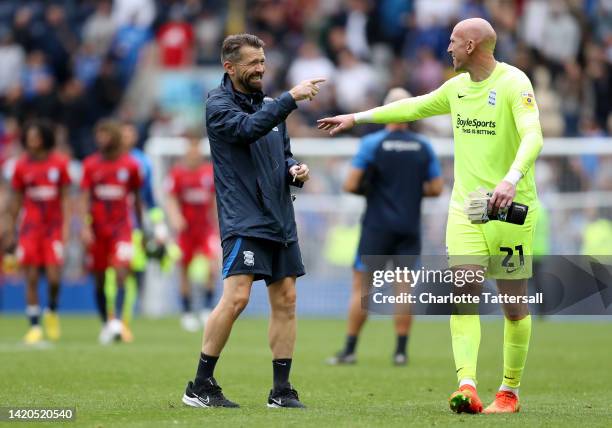 Matt Gardiner, Assistant Head Coach of Birmingham City celebrates with John Ruddy of Birmingham City following their victory in the Sky Bet...