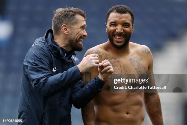 Matt Gardiner, Assistant Head Coach of Birmingham City celebrates with Troy Deeney of Birmingham City following their victory in the Sky Bet...