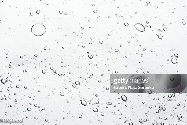 close up macro aloe vera gel cosmetic texture white background with bubbles. - bubble stockfoto's en -beelden