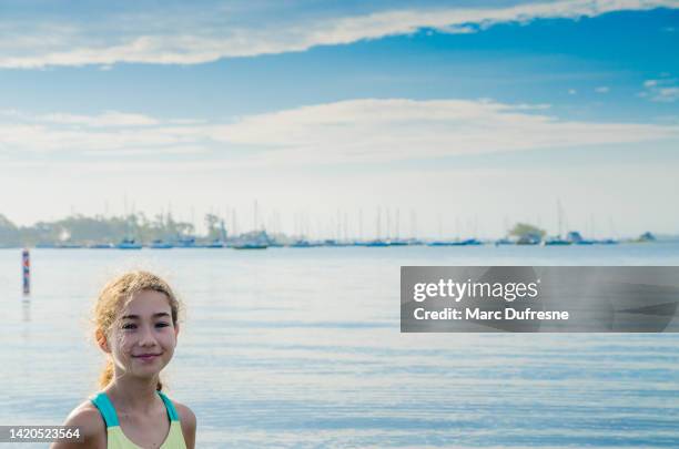 headshot of teenage girl by water - groton stock pictures, royalty-free photos & images