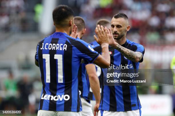 Marcelo Brozovic of FC Internazionale celebrates scoring their side's first goal with teammate Joaquin Correa during the Serie A match between AC...