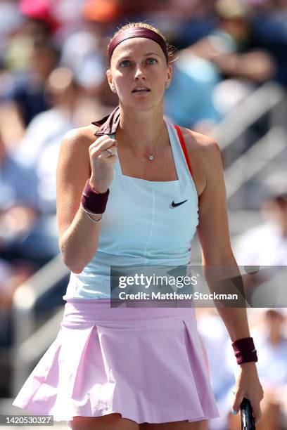 Petra Kvitova of Czech Republic celebrates after winning the second set against Garbine Muguruza of Spain during their Women's Singles Third Round...