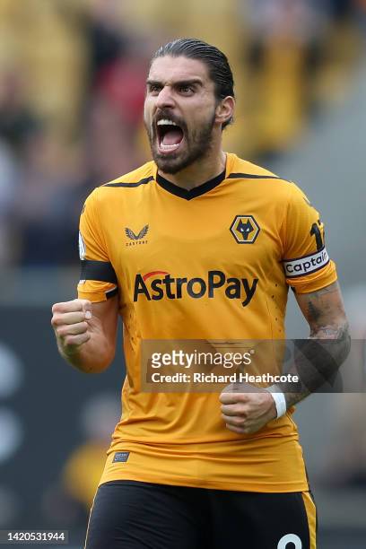 Ruben Neves of Wolverhampton Wanderers celebrates after their sides victory during the Premier League match between Wolverhampton Wanderers and...