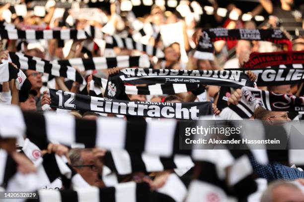 Eintracht Frankfurt fans show their support with scarfs prior to the Bundesliga match between Eintracht Frankfurt and RB Leipzig at Deutsche Bank...