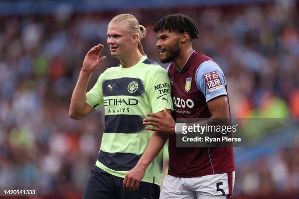 Erling Haaland of Manchester City and Tyrone Mings of Aston Villa interact during the Premier League match between Aston Villa and Manchester City at...