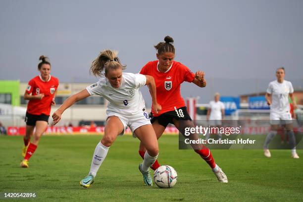 Georgia Stanway of England is challenged by Laura Feiersinger of Austria during the FIFA Women's World Cup 2023 Qualifier group D match between...