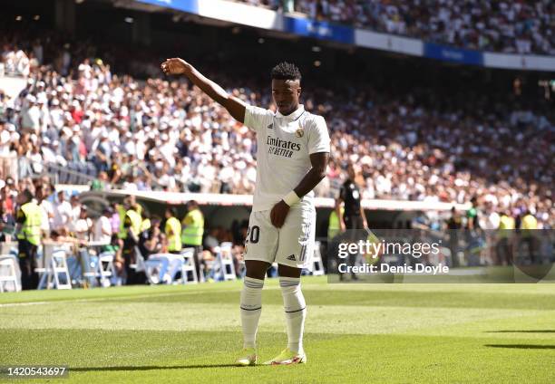 Vinicius Junior of Real Madrid celebrates after scoring their team's opening goal during the LaLiga Santander match between Real Madrid CF and Real...