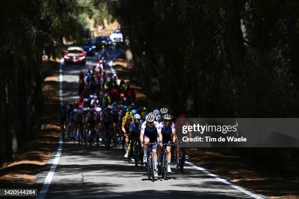 Rémi Cavagna of France, Dries Devenyns of Belgium, Remco Evenepoel of Belgium and Team Quick-Step - Alpha Vinyl - Red Leader Jersey with teammates...