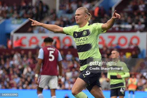 Erling Haaland of Manchester City celebrates after scoring their team's first goal during the Premier League match between Aston Villa and Manchester...