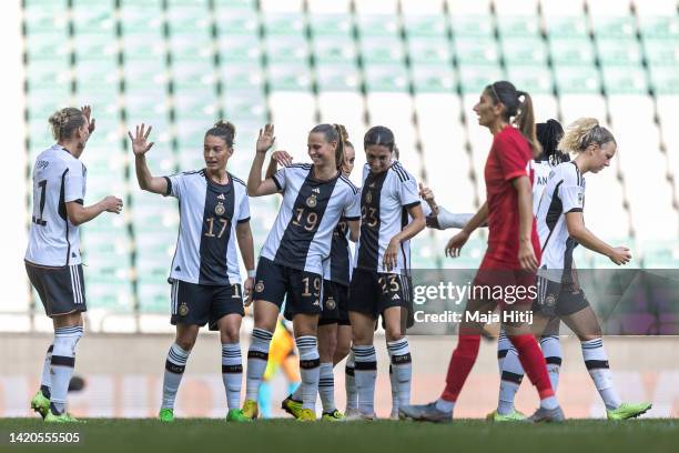 Klara Buehl of Germany celebrates with her team mates after scoring her team second goal during the 2023 FIFA Women's World Cup qualification match...