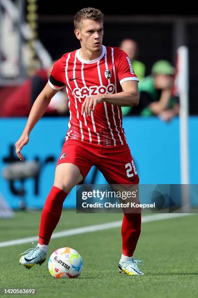 Matthias Ginter of Freiburg runs with the ball during the Bundesliga match between Bayer 04 Leverkusen and Sport-Club Freiburg at BayArena on...