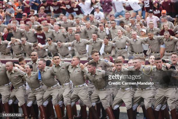 Corps Of Cadets cheer during the game between the Texas A&M Aggies and the Sam Houston State Bearkats during the first half at Kyle Field on...