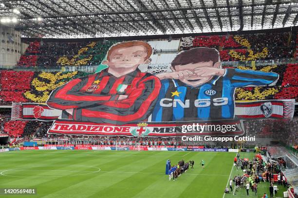 Fans of AC Milan attend during the Serie A match between AC Milan and FC Internazionale at Stadio Giuseppe Meazza on September 03, 2022 in Milan,...