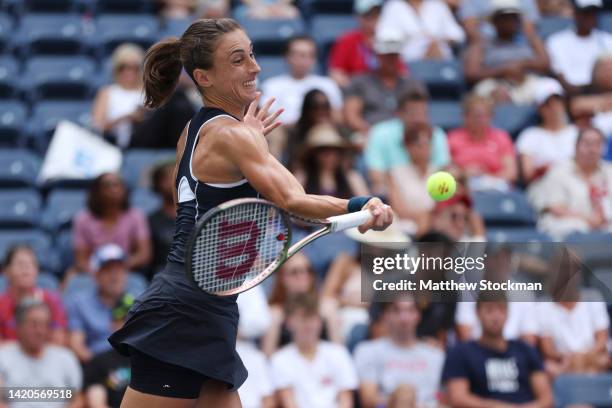 Petra Martic of Croatia plays a forehand against Victoria Azarenka during their Women's Singles Third Round match on Day Six of the 2022 US Open at...