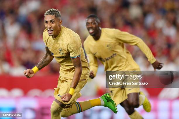 Raphinha of FC Barcelona celebrates scoring their side's first goal during the LaLiga Santander match between Sevilla FC and FC Barcelona at Estadio...