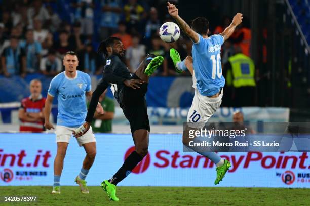 Luis Alberto of SS Lazio compete for the ball with Andrè Frank Zambo Angussa of SSC Napoli during the Serie A match between SS Lazio and SSC Napoli...