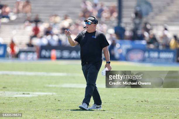 Head coach Chip Kelly of the UCLA Bruins signals during a game against the Bowling Green Falcons in the first half at Rose Bowl on September 03, 2022...