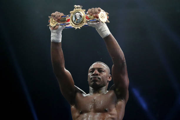 Dan Azeez celebrates their victory with their match belt after defeating Shaken Pitters during the 12x3 British Light-Heavyweight Title fight between...