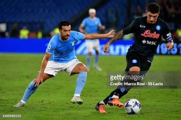 Pedro Rodriguez of SS Lazio compete for the ball with Giovanni Di Lorenzo of SSC Napoli during the Serie A match between SS Lazio and SSC Napoli at...
