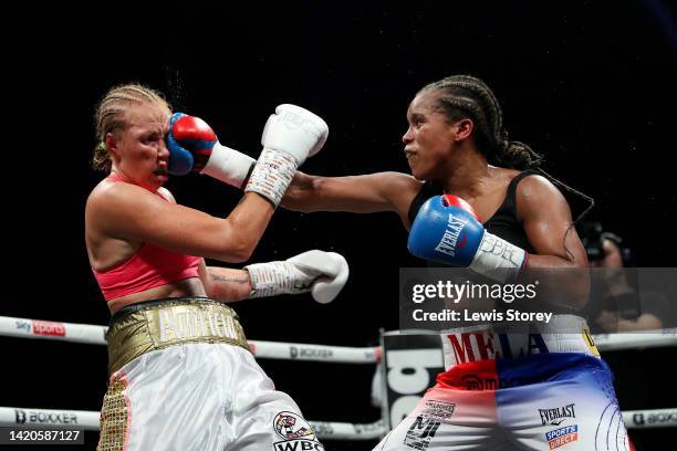 Patricia Berghult is punched by Natasha Jonas during the 10x2 WBO / WBC Super-Welterweight Titles fight between Natasha Jonas and Patricia Berghult...