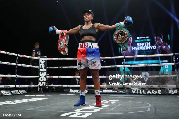 Natasha Jonas poses for a photograph with their title belts after their victory after defeating Patricia Berghult during the 10x2 WBO / WBC...