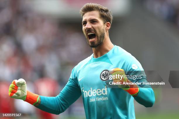 Kevin Trapp of Eintracht Frankfurt celebrates after teammate Daichi Kamada scores their team's first goal during the Bundesliga match between...