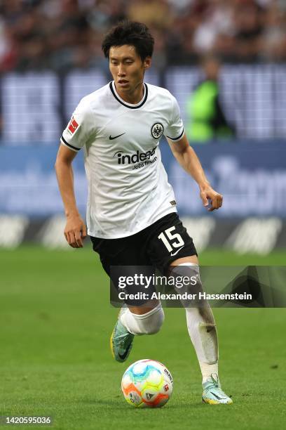 Daichi Kamada of Frankfurt runs with the ball during the Bundesliga match between Eintracht Frankfurt and RB Leipzig at Deutsche Bank Park on...