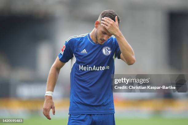 Tom Krauß of FC Schalke 04 react after the Bundesliga match between VfB Stuttgart and FC Schalke 04 at Mercedes-Benz Arena on September 03, 2022 in...