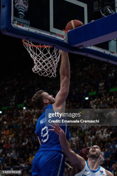 Nicolo Melli of Italy, blocks the shot of Nick Calathes of Greece, during the FIBA EuroBasket 2022 group C match between Greece and Italy at Forum di...