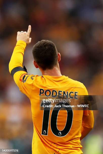 Daniel Podence of Wolverhampton Wanderers celebrates after scoring his team's first goal during the Premier League match between Wolverhampton...