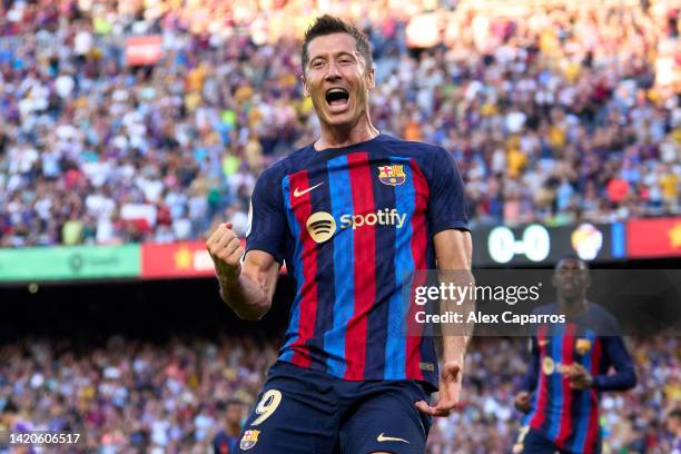Robert Lewandowski of FC Barcelona celebrates after scoring the opening goal during the LaLiga Santander match between FC Barcelona and Real...