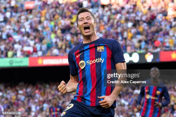 Robert Lewandowski of FC Barcelona celebrates after scoring the opening goal during the LaLiga Santander match between FC Barcelona and Real...