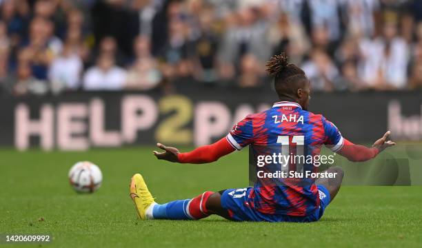 Crystal Palace striker Wilfried Zaha reacts after being fouled during the Premier League match between Newcastle United and Crystal Palace at St....