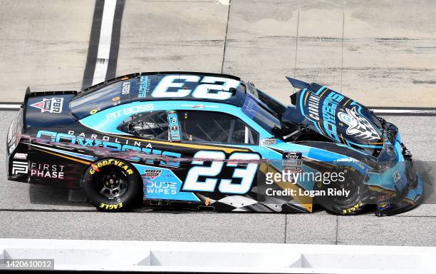 Anthony Alfredo, driver of the Carolina Cowboys Chevrolet, drives a damaged car after an on-track incident during the NASCAR Xfinity Series Sport...