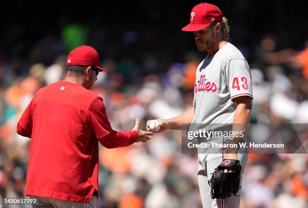 Manager Rob Thomson of the Philadelphia Phillies takes the ball from Noah Syndergaard taking him out of the game against the San Francisco Giants in...
