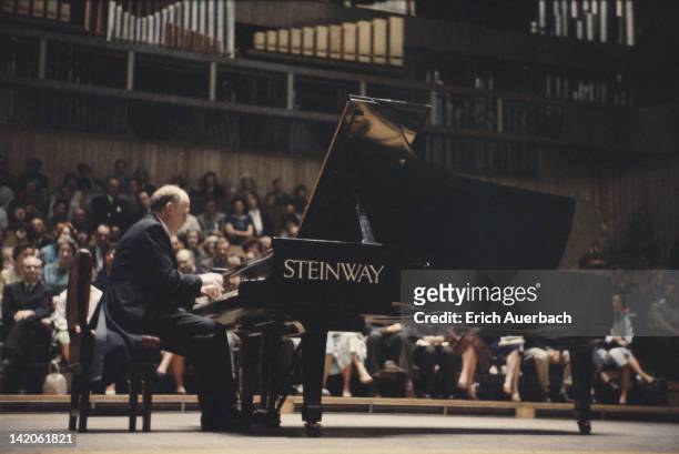 Soviet pianist Sviatoslav Richter performs on a Steinway piano, circa 1965.