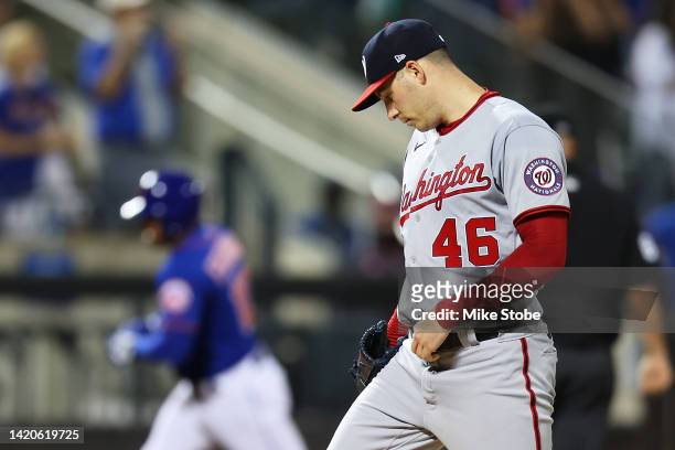 Patrick Corbin of the Washington Nationals reacts after giving up a third inning home run to Eduardo Escobar of the New York Mets at Citi Field on...