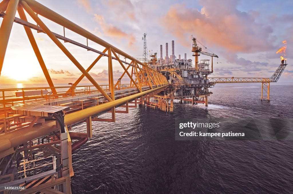 Sunset of an offshore oil rig platform