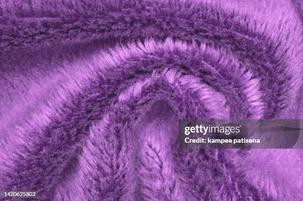 texture of purple flannel fabric - cozy blankets folded stock pictures, royalty-free photos & images