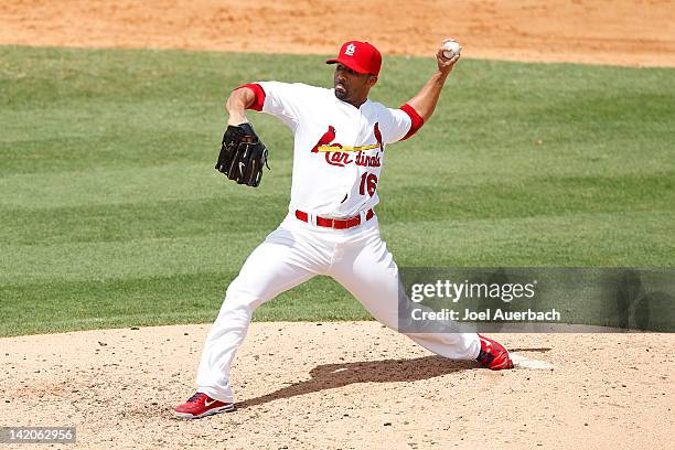 Romero of the St. Louis Cardinals throws the ball against the Detroit Tigers during a Grapefruit League spring training game at Roger Dean Stadium on...